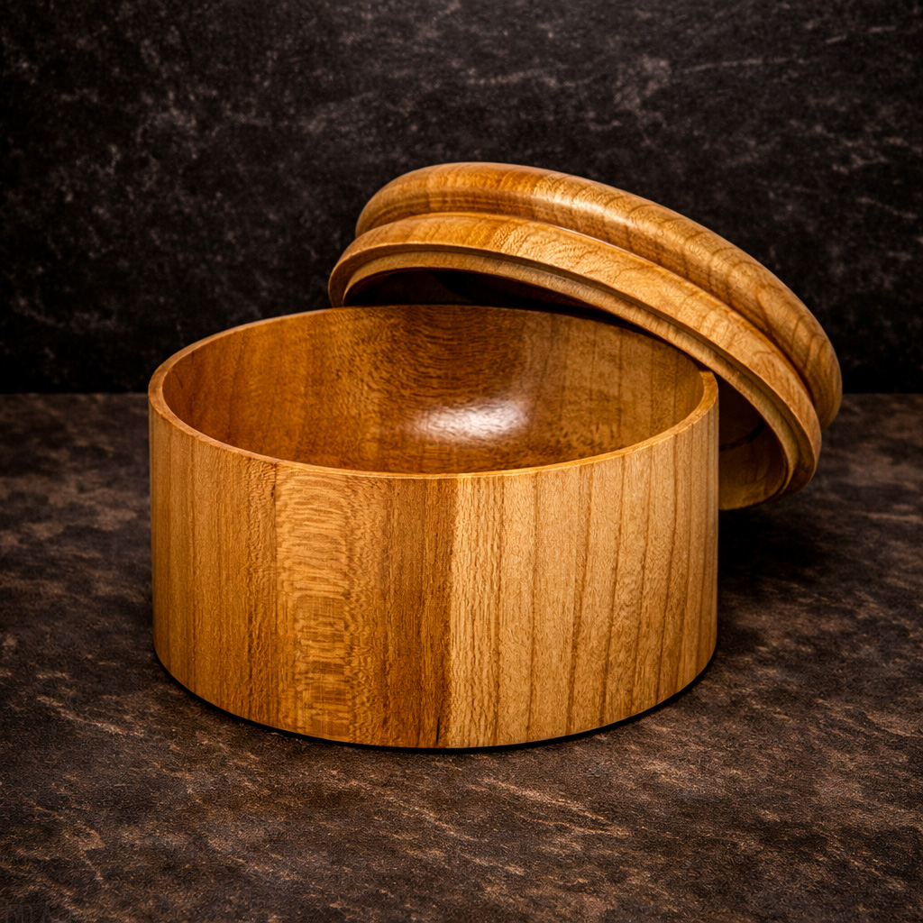 Cherry lidded box with sapwood contrast.