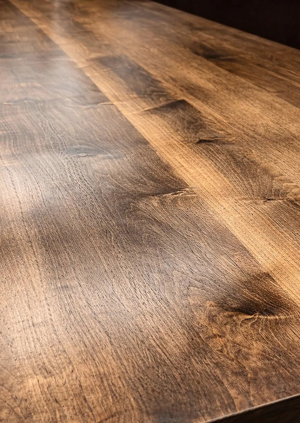 Close detail of maple tabletop grain.